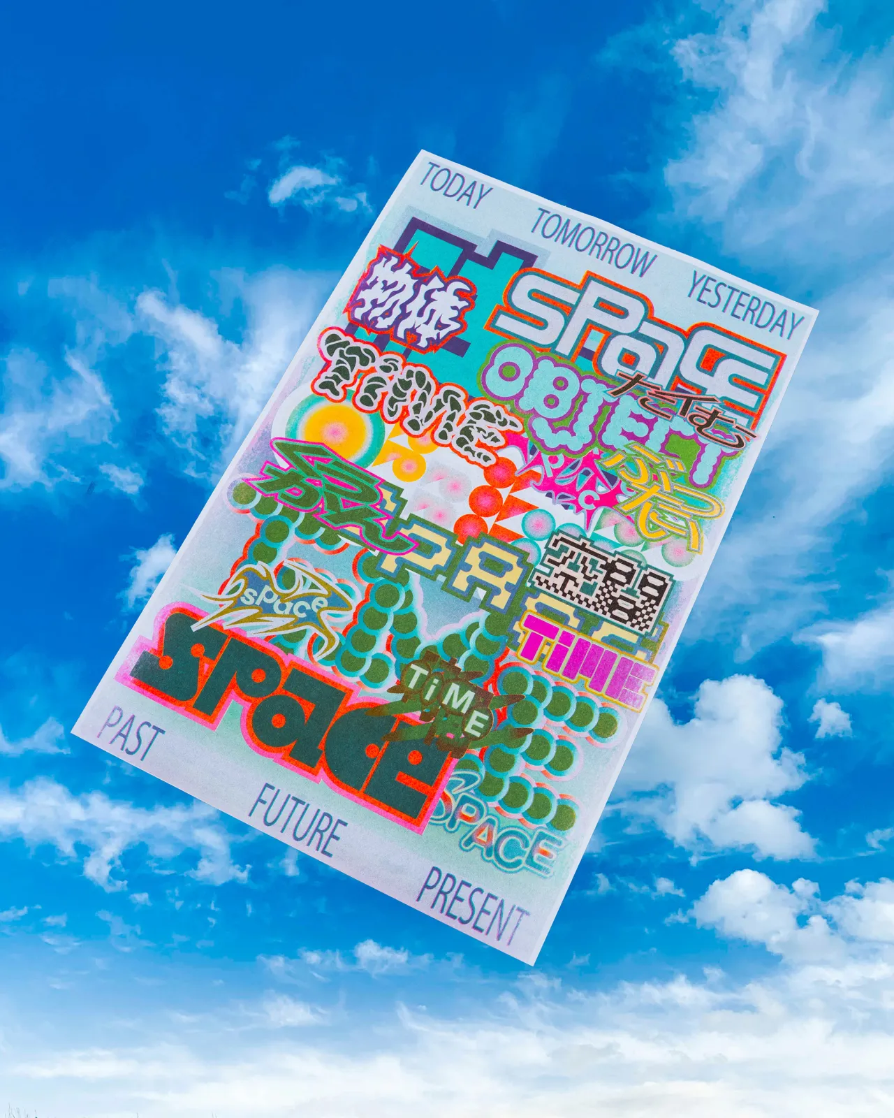 Colourful typographic poster with layered text reading "Today Tomorrow Yesterday" and "Space" in vibrant pink, cyan, yellow and green against a blue sky with white clouds